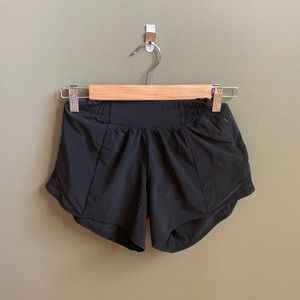 Lululemon like new black low rise hotty hot shorts 4”